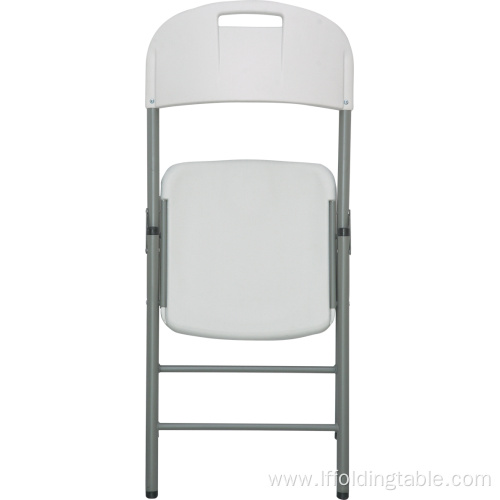 White plastic folding chair